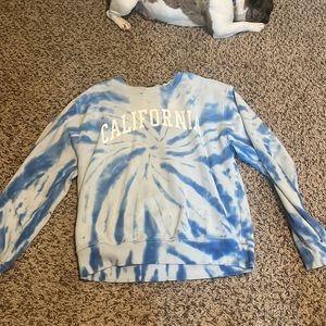 Bought at Forever 21. blue and white tie dye crew neck. size small.